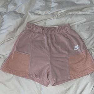 Light pink Nike fleece shorts